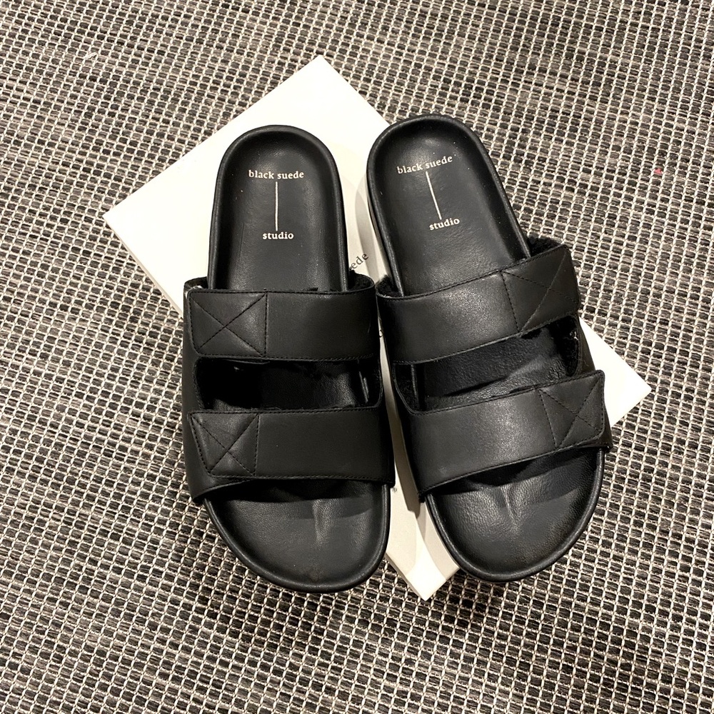 Black leather and shearling lined slides by Black Suede Studios, size 40